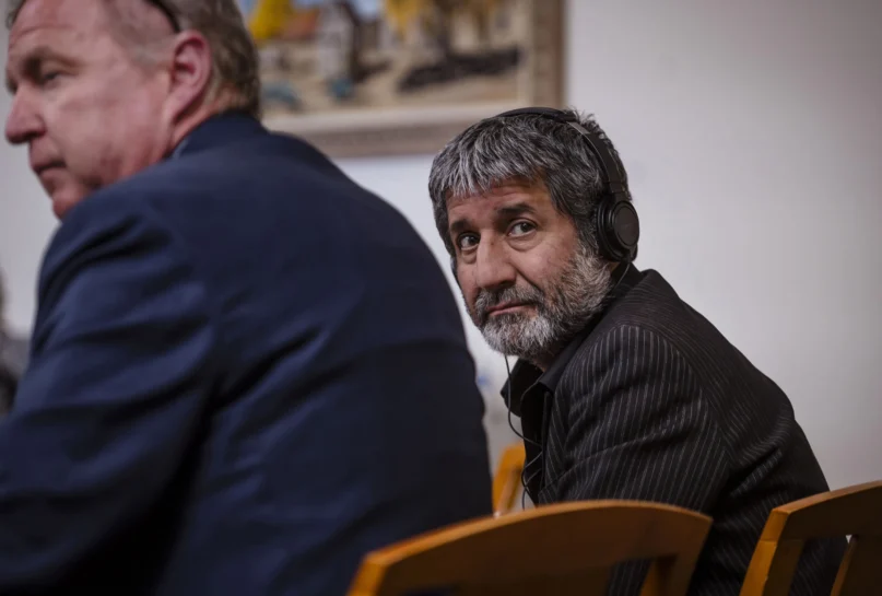 Muhammad Syed sits next to his defense attorney Thomas Clark, left, during closing arguments at the Bernalillo County Courthouse in Downtown Albuquerque, N.M., on Friday, March 15, 2024. (Chancey Bush/The Albuquerque Journal via AP, Pool)