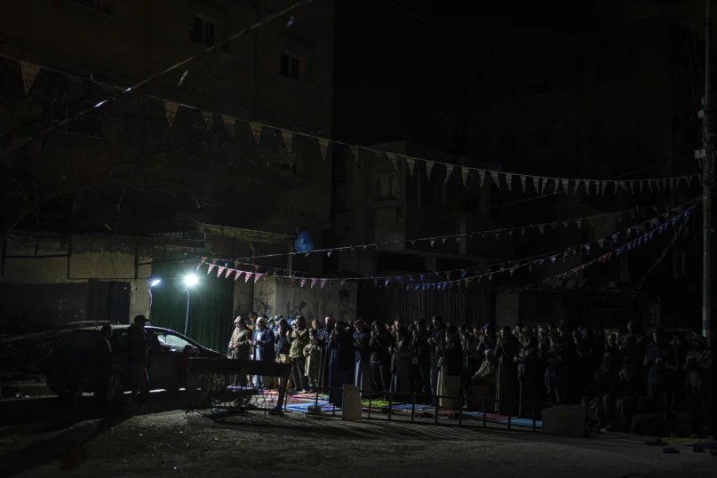 Muslim worshippers perform “tarawih,” an extra lengthy prayer held during the Muslim holy month of Ramadan, in Rafah, Gaza Strip, Sunday, March 10, 2024. (AP Photo/Fatima Shbair)