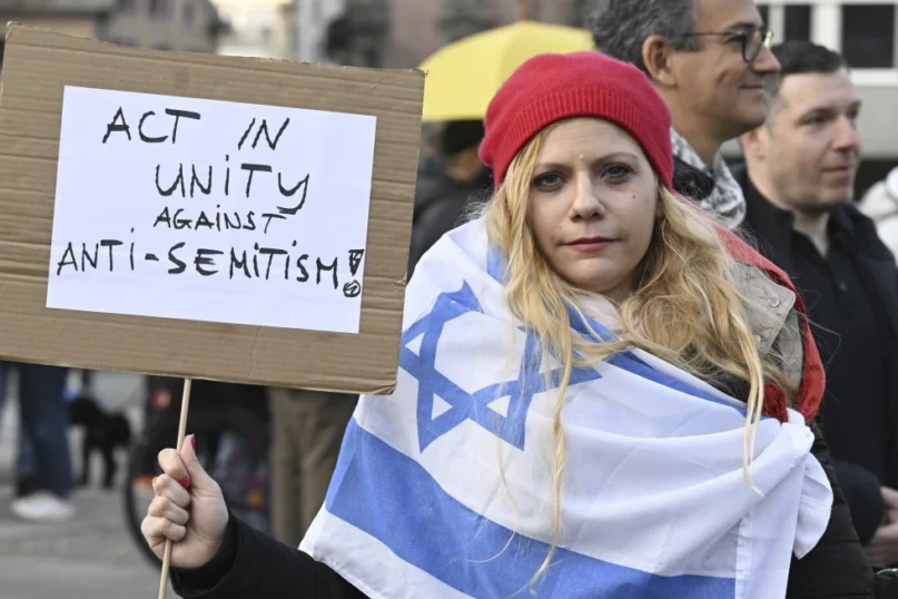 People take part in vigil at the Helvetia square in Zurich, Switzerland, Sunday, March 3, 2024. On Saturday evening, a young man had stabbed an orthodox Jew. (Walter Bieri/Keystone via AP)