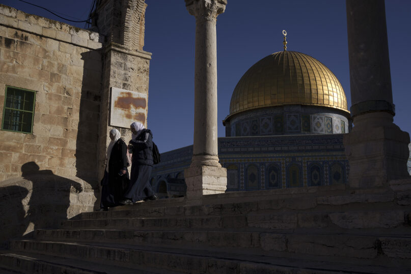 Muslim women walk near the Dome of the Rock shrine at the Al-Aqsa Mosque compound in the Old City of Jerusalem, Feb. 29, 2024. (AP Photo/Leo Correa)