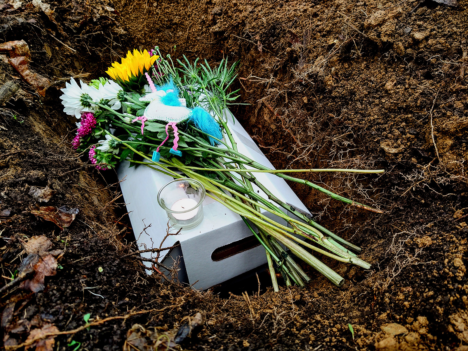 Burial following an animal funeral. (Photo courtesy Sarah Bowen)