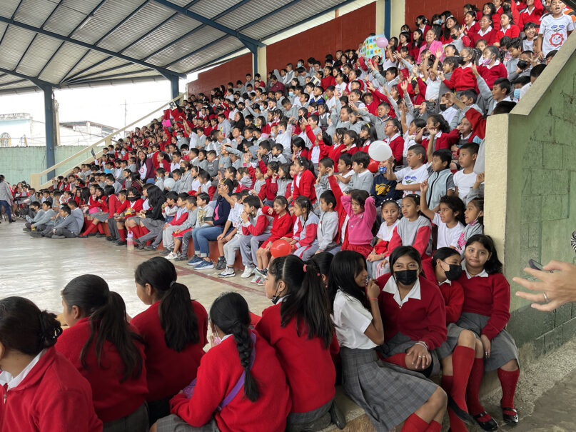 School children assemble for an Open the Book program at a public school in Mixco, Guatemala, in Nov. 2023. (RNS photo/Catherine Pepinster)