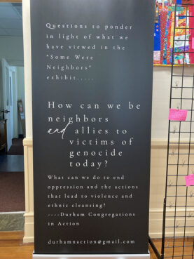 First Presbyterian Church has agreed to accept a banner at the end of the exhibit that asks, “How can we be neighbors and allies to victims of genocide today?” (RNS photo/Yonat Shimron)
