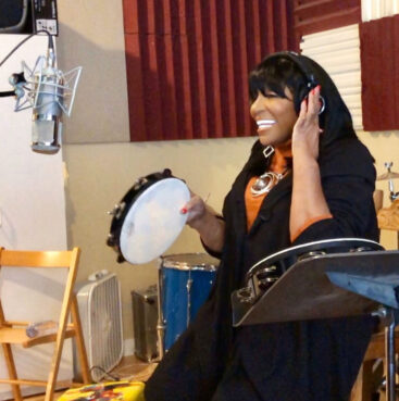 Pastor Sandra Crouch laughs in the recording studio in 2023. Courtesy photo by Robyn Hill for the Sandra Crouch Estate