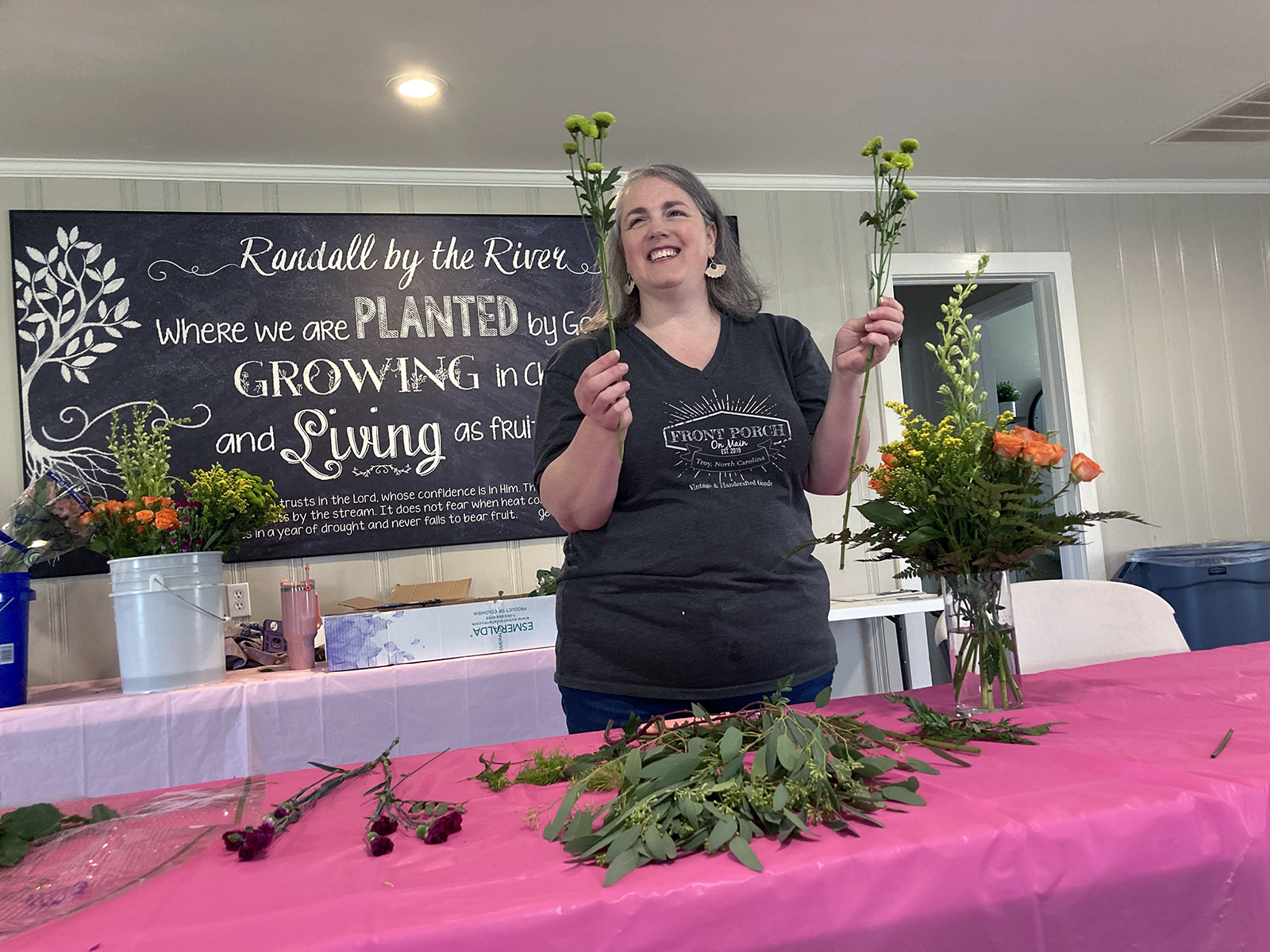 Melanie Nichols, a florist instructor from Troy, North Carolina, leads a flower arrangement class, Saturday, April 13, 2024, at Randall by the River in Norwood, North Carolina. (RNS photo/Yonat Shimron)