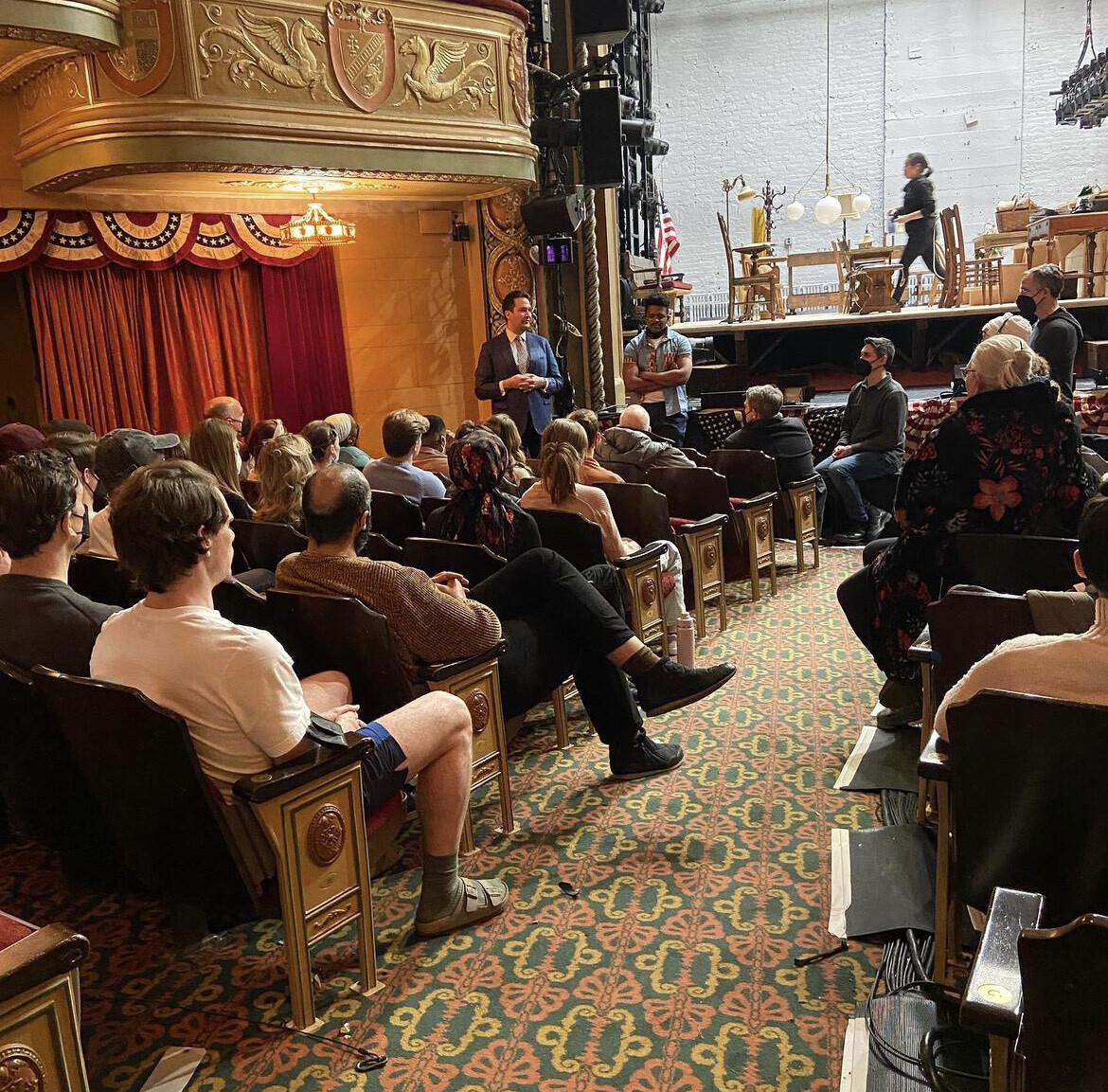 Rabbi Joshua Stanton and Matthew Johnson Harris, standing middle left and right, speak with a theater company. (Courtesy photo)