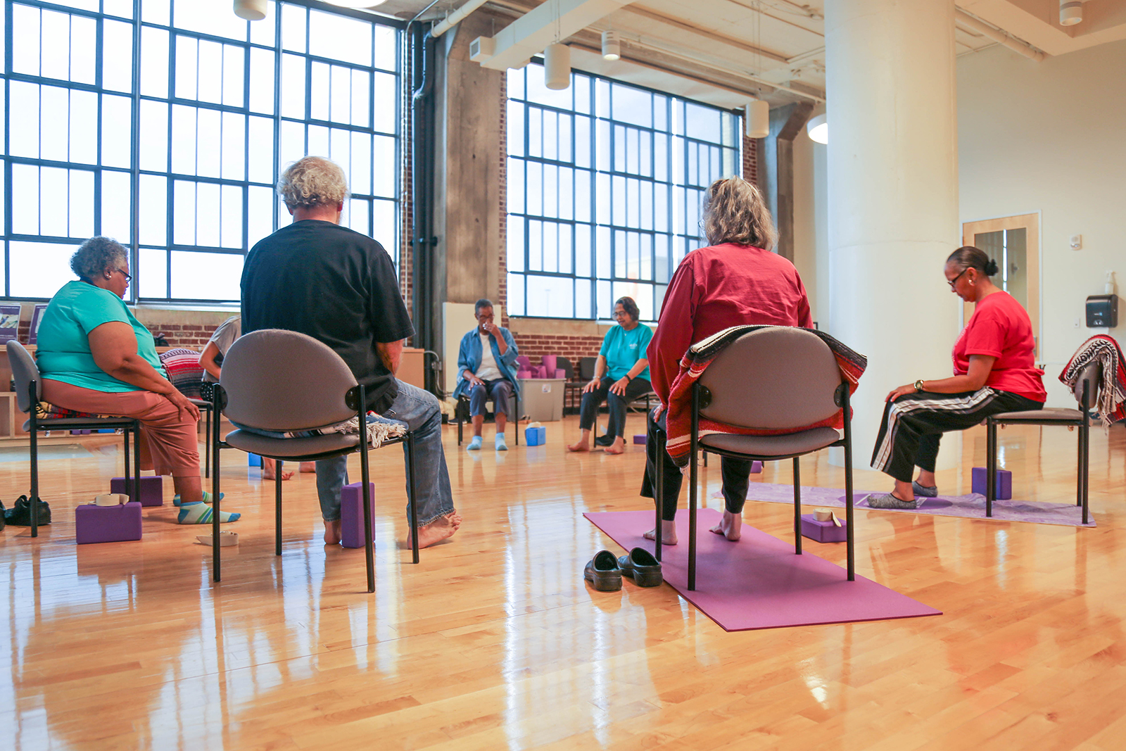 People participate in chair yoga at Church Health YMCA in Memphis, Tenn. (Photo courtesy Church Health)