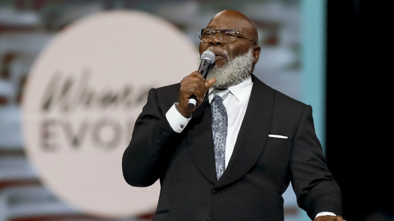 Bishop T.D. Jakes shares a message prior to his daughter Sarah Jakes Roberts taking the stage at the kickoff of the three-day Woman Evolve conference on Sept. 14, 2023, at Globe Life Field in Arlington, Texas. (Gareth Patterson/AP Images for Woman Evolve)