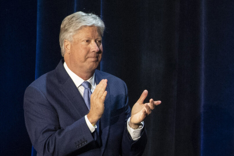 FILE - Pastor Robert Morris applauds during a roundtable discussion at Gateway Church Dallas Campus, Thursday, June 11, 2020, in Dallas. A statement issued on Tuesday, June 18, 2024, said that Morris has resigned after a woman said he had abused her on multiple occasions in the 1980s, beginning when she was 12. (AP Photo/Alex Brandon, File)