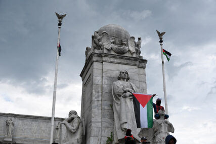 Demonstrators took down U.S. flags outside Union Station, burned the flags, and then replaced them with Palestinian flags, Wednesday, July 24, 2024, in Washington. (RNS photo/Jack Jenkins)