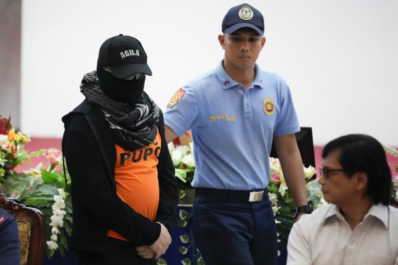 A Filipino preacher on the run from sexual abuse charges surrenders