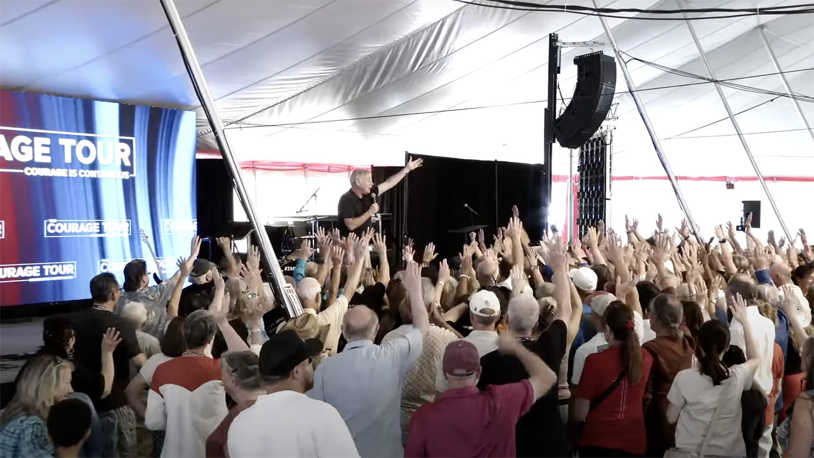 Politics tamfitronics Lance Wallnau, top center, during a Courage Tour event in Phoenix, Arizona, in April 2024. (Video screen grab)