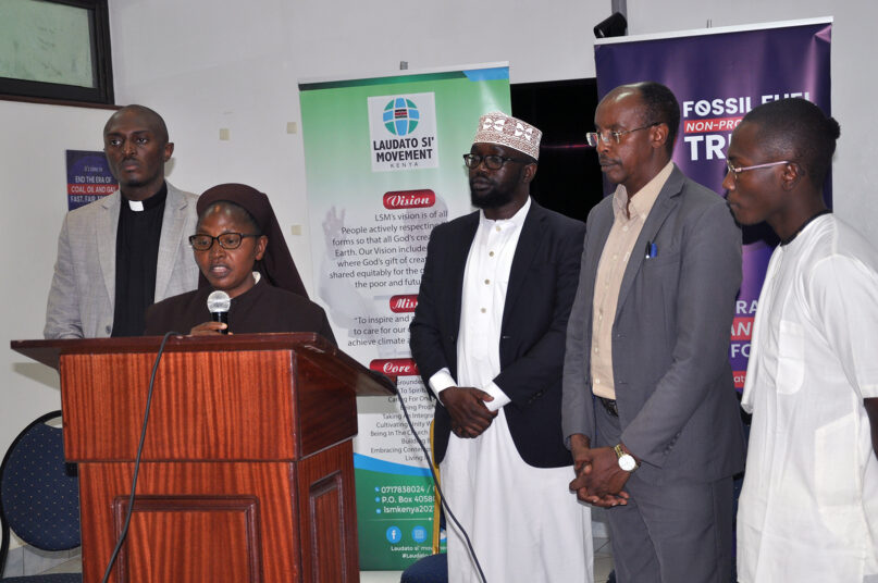 Sister Mary Wangare, director of justice, peace and integrity of creation at Franciscan Africa, reads a statement during an interfaith media briefing on the Fossil Fuel Treaty in Nairobi, Kenya, Friday, Sept. 20, 2024. The Rev. Dennis Nthenge, of Green Anglican, from left, Hakeem Khalid from Supreme Council of Kenya Muslims, the Rev. Peter Mbaro, director, centre for social justice and ethics at Catholic University of Eastern Africa and Kamita, of Hare Krishna group, join the briefing. (Photo by Fredrick Nzwili)