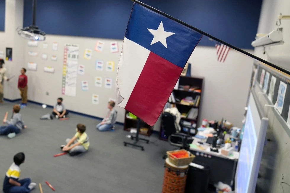 A Texas flag is displayed in an elementary school in Murphy, Texas