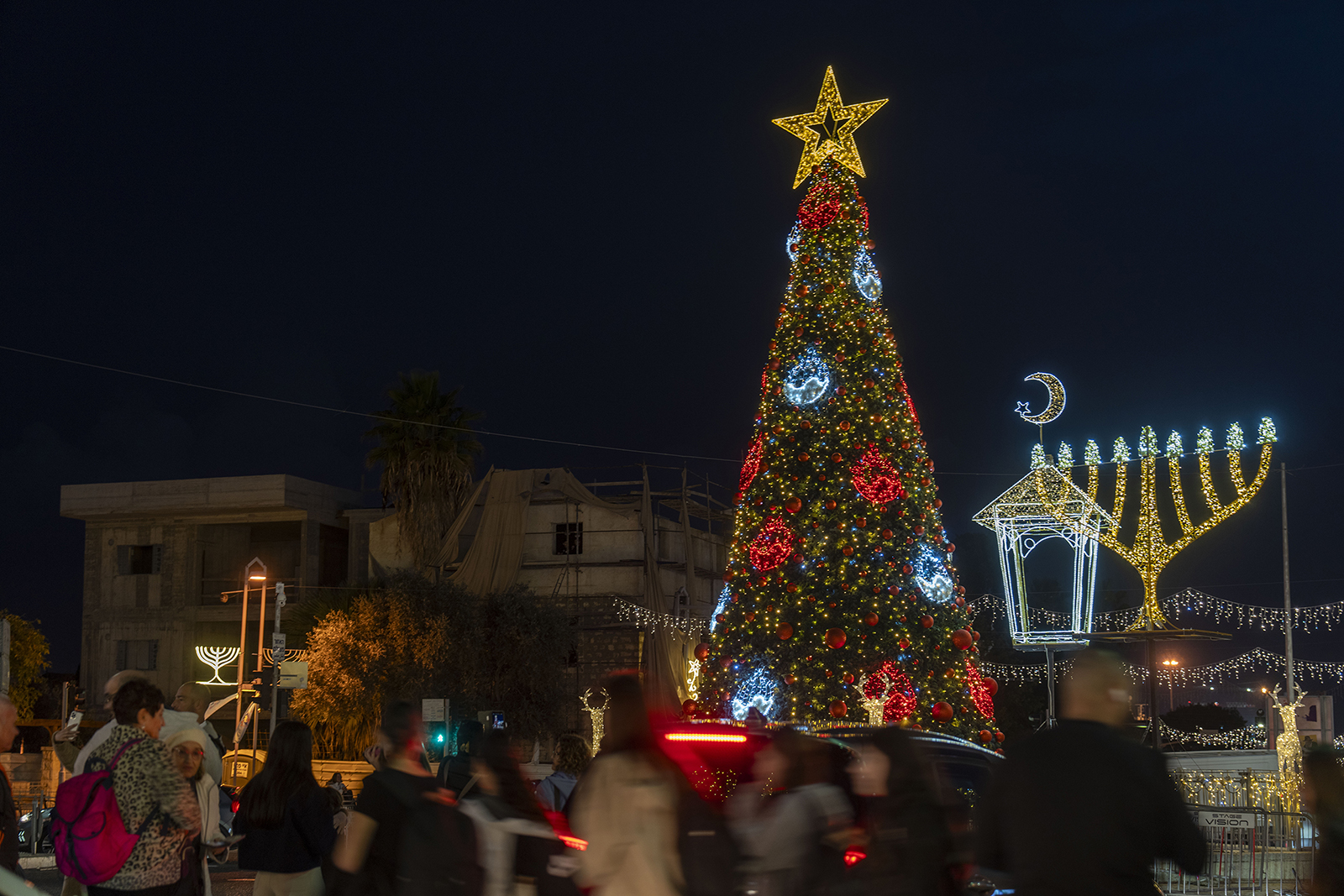 In Israel and occupied territories, Christmas and Hanukkah converge in sober celebrations