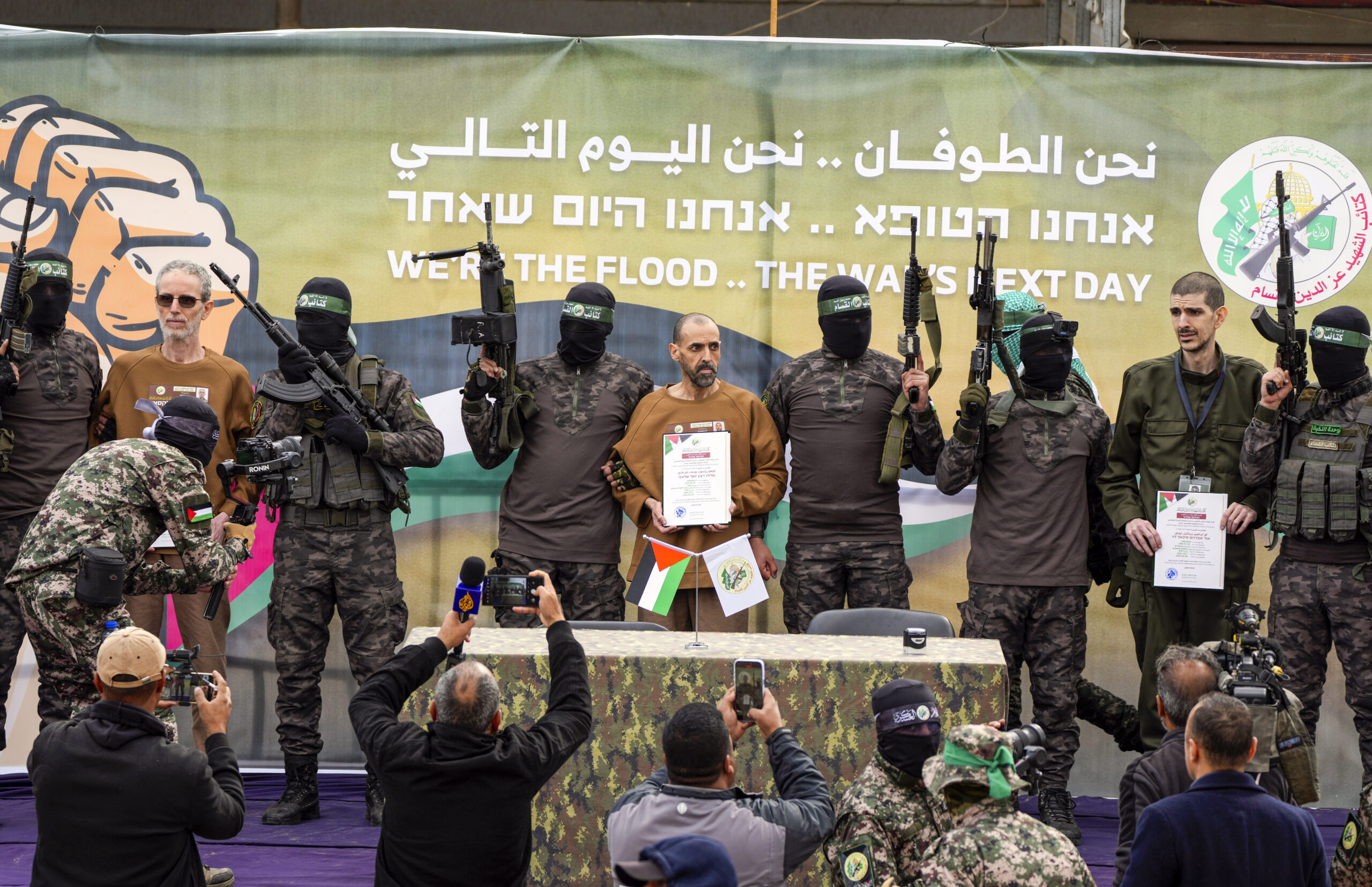 Hamas says it will delay the release of more hostages, putting Gaza ceasefire at risk