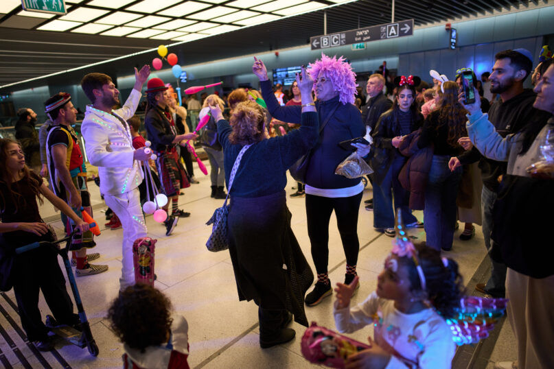 Purim parties shift to bomb shelters as Israelis celebrate under Iran war threat