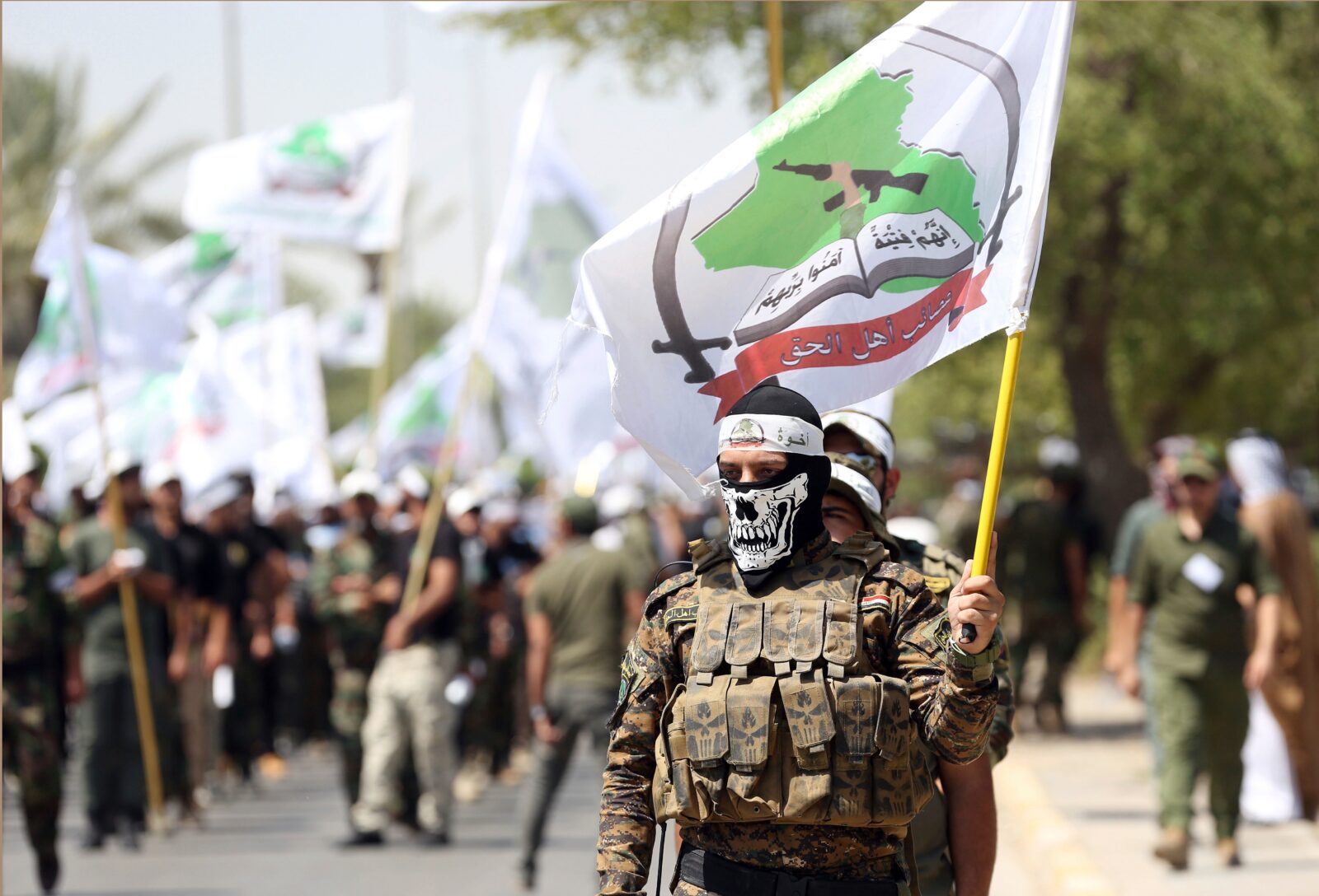 Powerful Iran-backed militias in Iraq say they will start handing in weapons to authorities