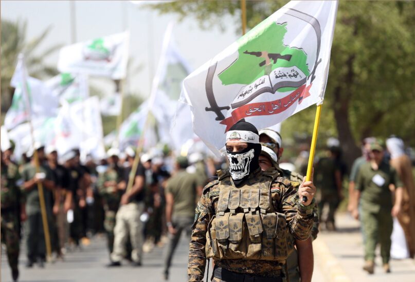 Powerful Iran-backed militias in Iraq say they will start handing in weapons to authorities