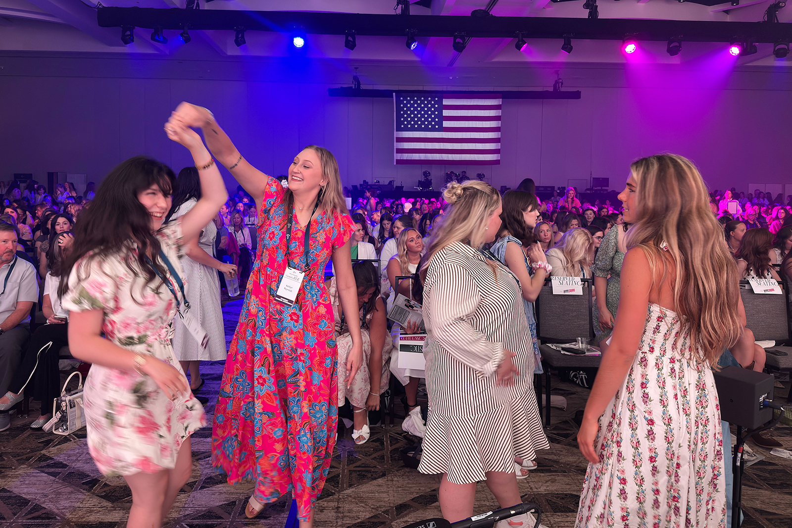 Some attendees dance between programming at the Turning Point USA Women’s Leadership Summit, Saturday, June 6, 2026, in San Antonio, Texas. (RNS photo/Kathryn Post)