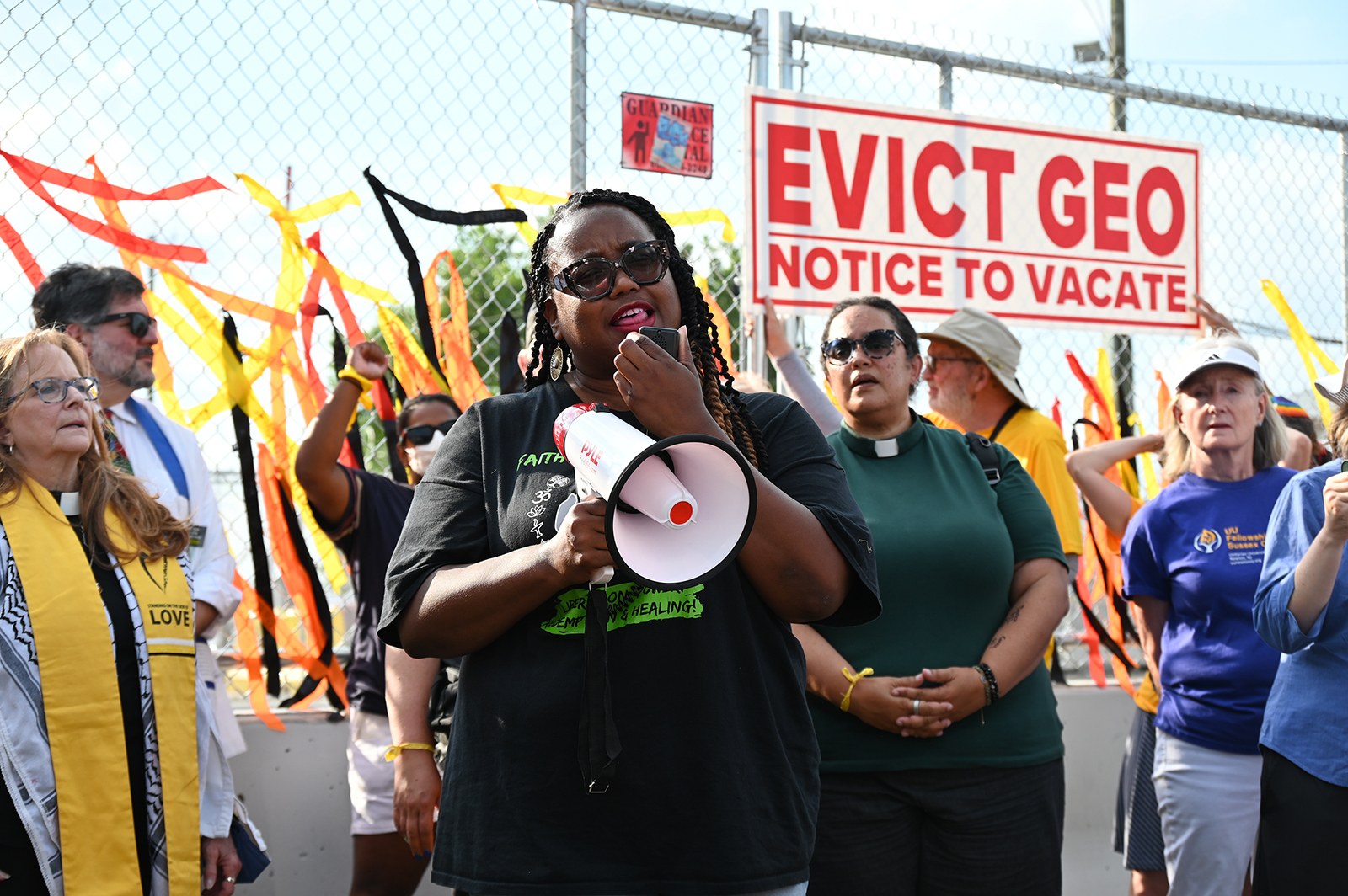 Amid ICE killings, more than 100 clergy from across the US stage protest at Delaney Hall