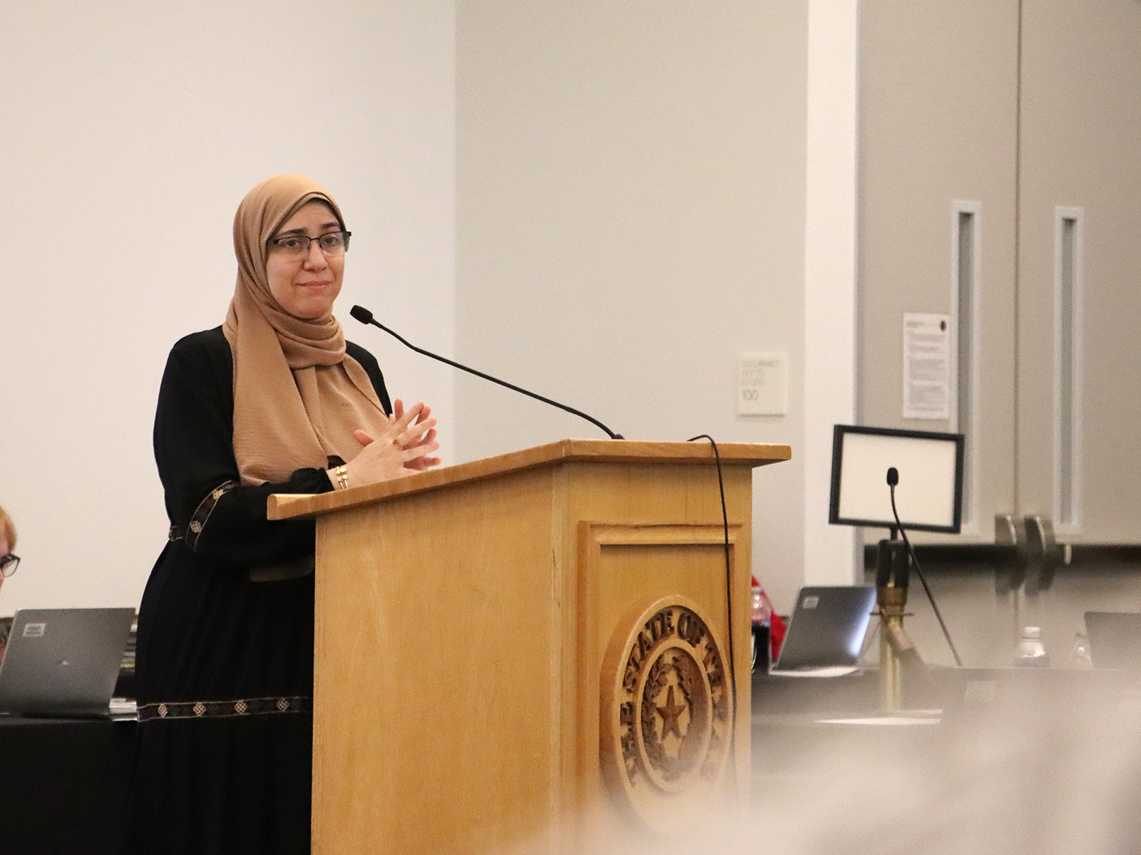 Shaimaa Zayan, operations manager of CAIR-Texas, addresses the State Board of Education meeting in the Barbara Jordan Building on Monday, June 22, 2026, in Austin, Texas. (RNS photo/Ulaa Kuziez)